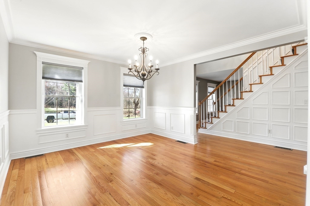 5 Bennett Road Hampden, MA 01036 - Photo 7 of 42 a view of an empty room with wooden floor and a window