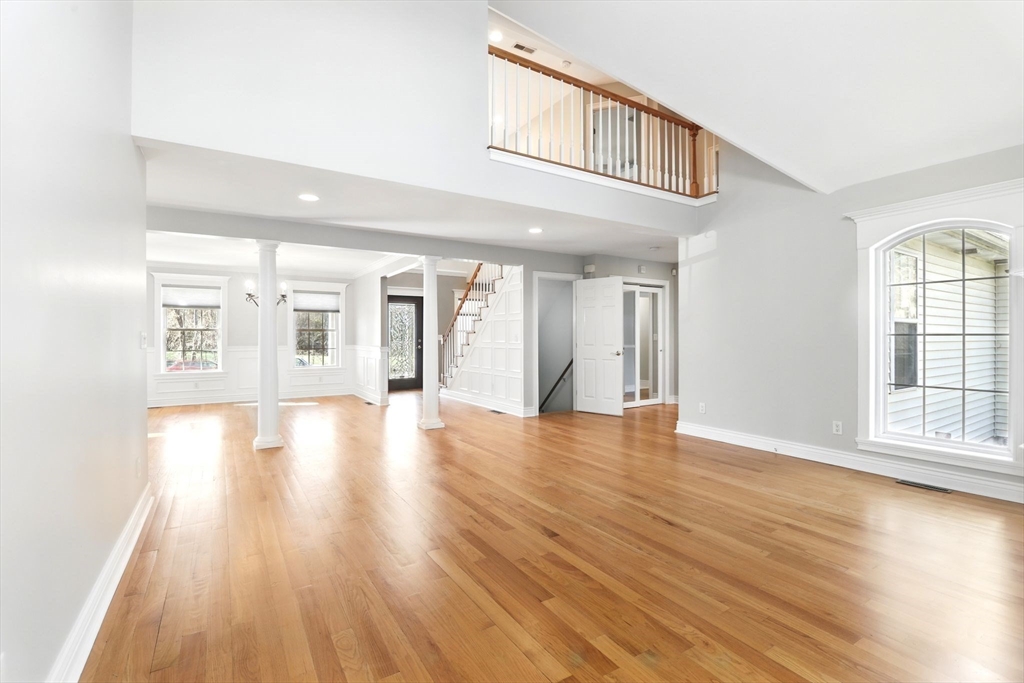 5 Bennett Road Hampden, MA 01036 - Photo 10 of 42 a view of an empty room with wooden floor and a window