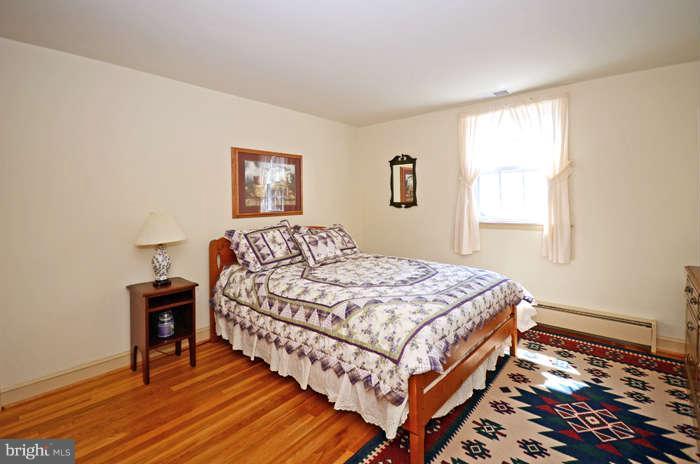 4453 Carroll Manor Road Baldwin, MD 21013 - Photo 17 of 30 a bedroom with a bed and a window