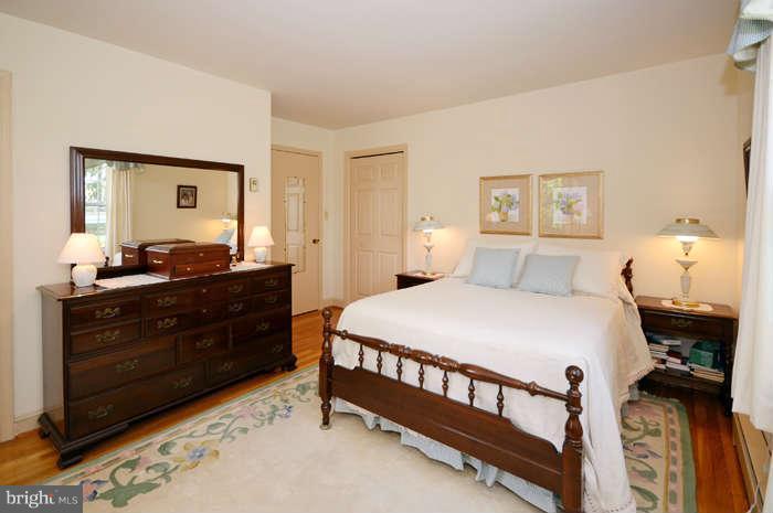 4453 Carroll Manor Road Baldwin, MD 21013 - Photo 22 of 30 a bedroom with a bed and a dresser