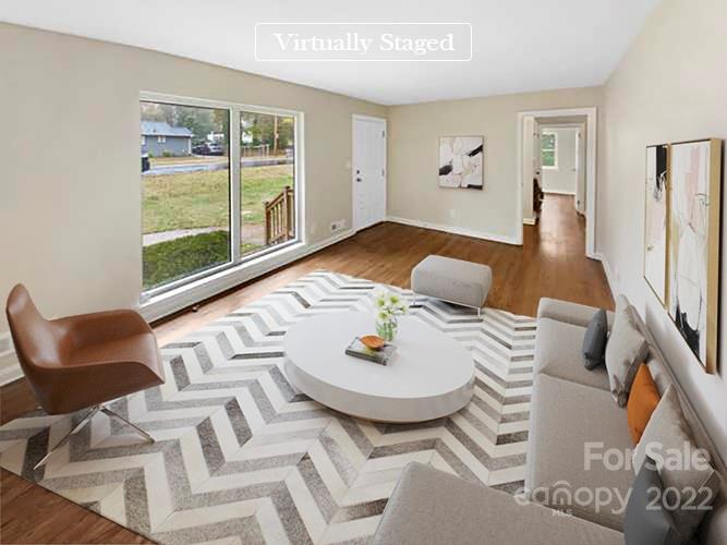 3209 Credenza Road Charlotte, NC 28208 - Photo 2 of 20 a living room with furniture and wooden floor