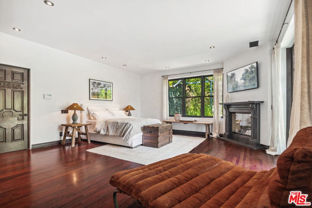 26799 Sea Vista Drive Malibu, CA 90265 - Photo 21 of 32 a living room with furniture fireplace and window
