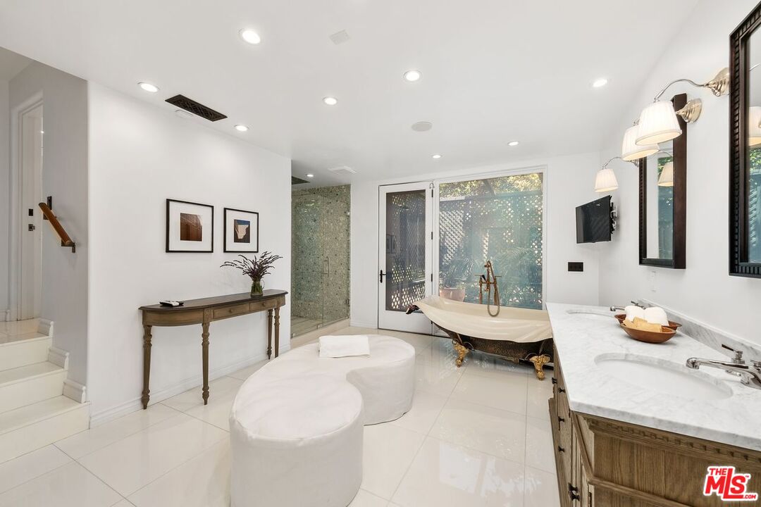 26799 Sea Vista Drive Malibu, CA 90265 - Photo 23 of 32 a living room with furniture and a table