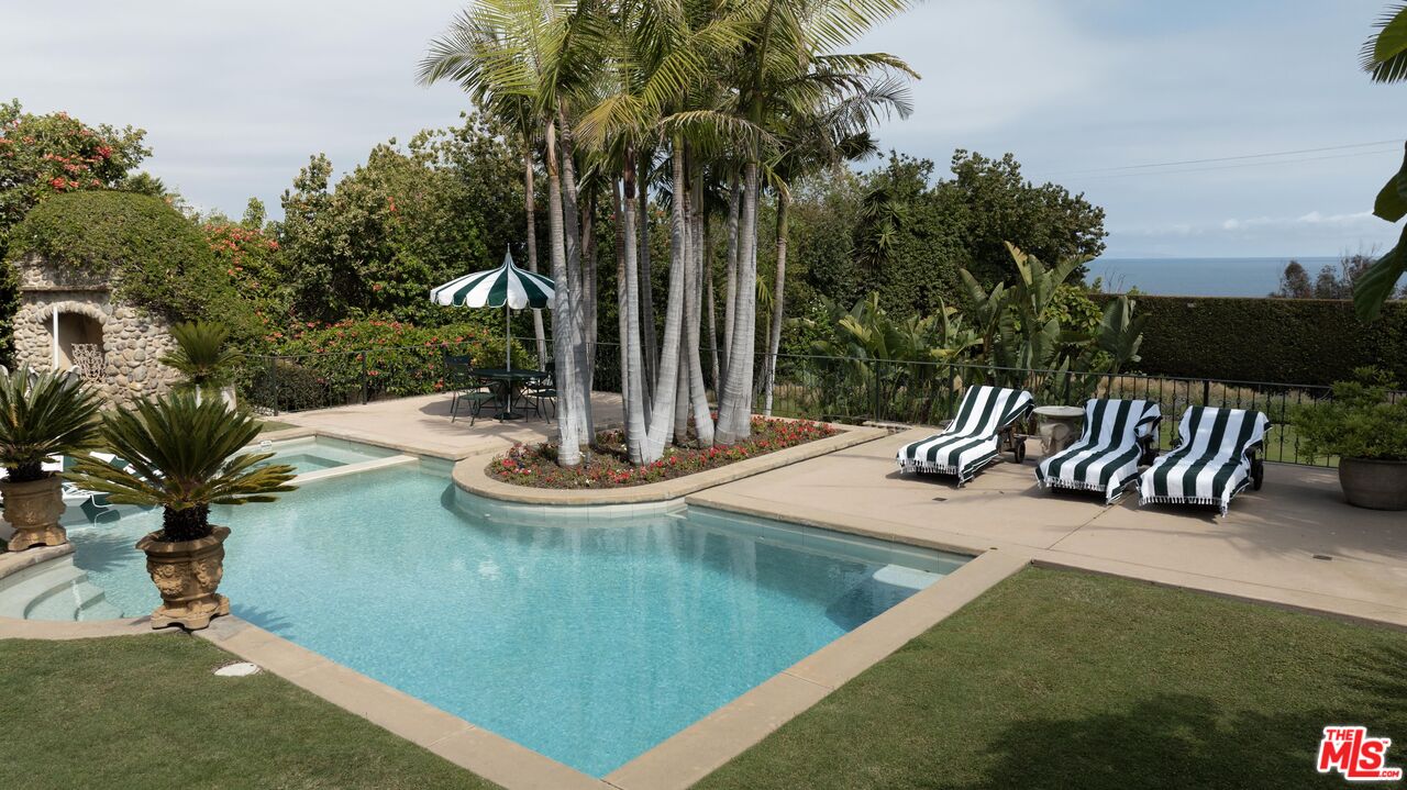 26799 Sea Vista Drive Malibu, CA 90265 - Photo 24 of 32 a view of a patio with a table and chairs