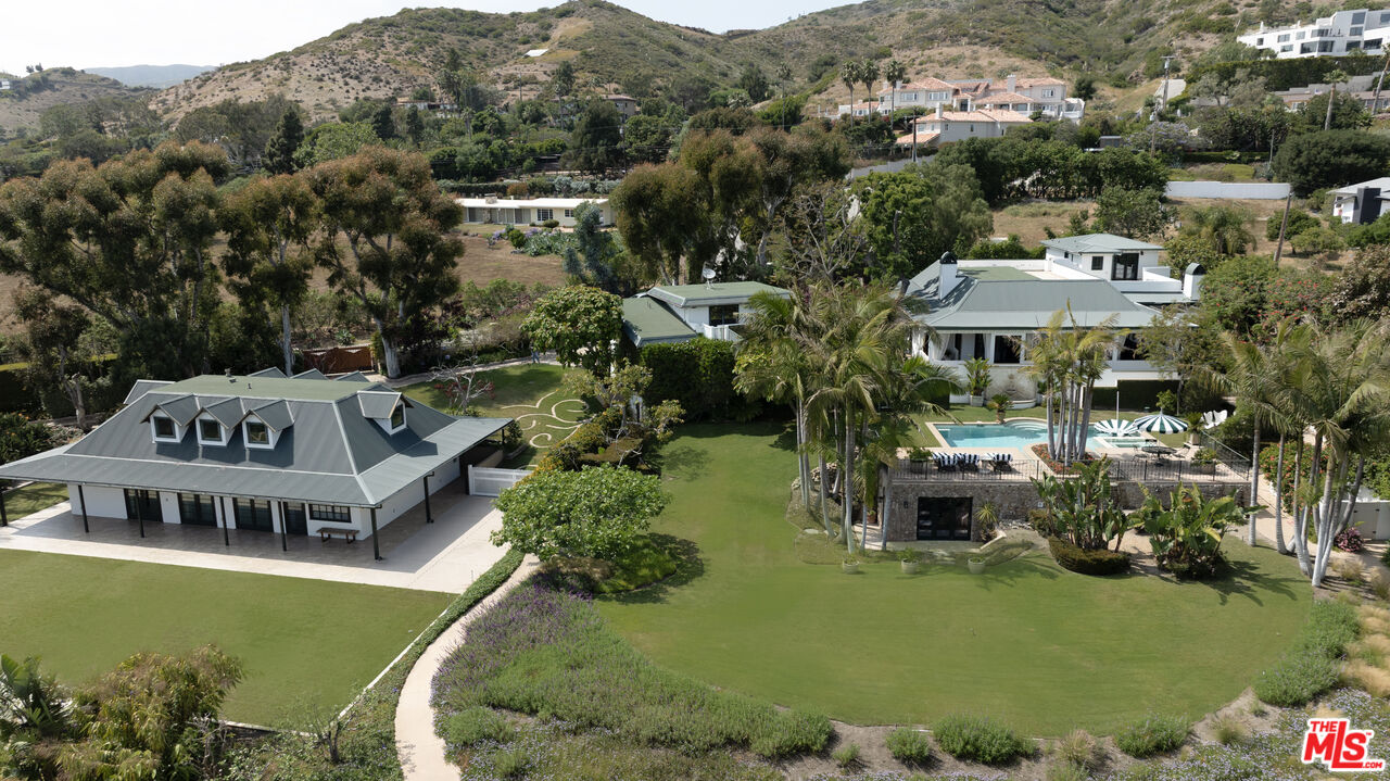 26799 Sea Vista Drive Malibu, CA 90265 - Photo 25 of 32 an aerial view of a house with a garden and lake view