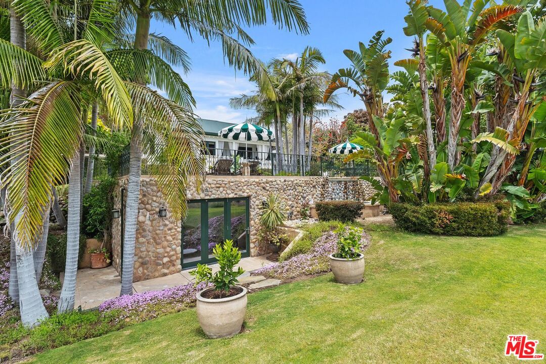 26799 Sea Vista Drive Malibu, CA 90265 - Photo 31 of 32 a view of a chair and table in the patio