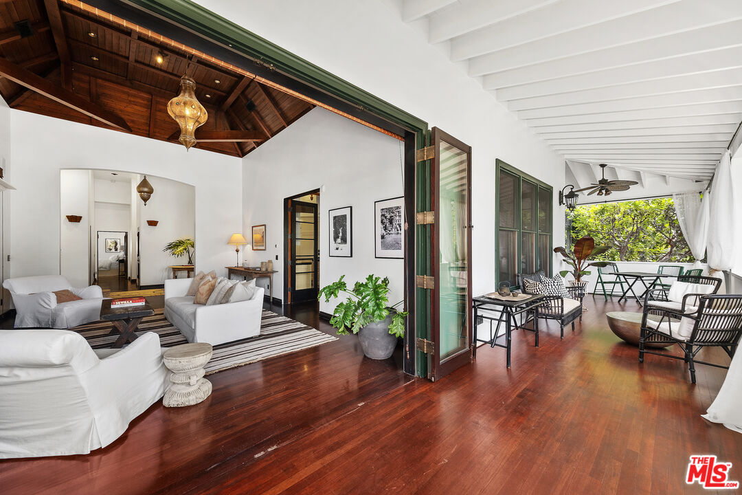 26799 Sea Vista Drive Malibu, CA 90265 - Photo 7 of 32 a living room with furniture and wooden floor