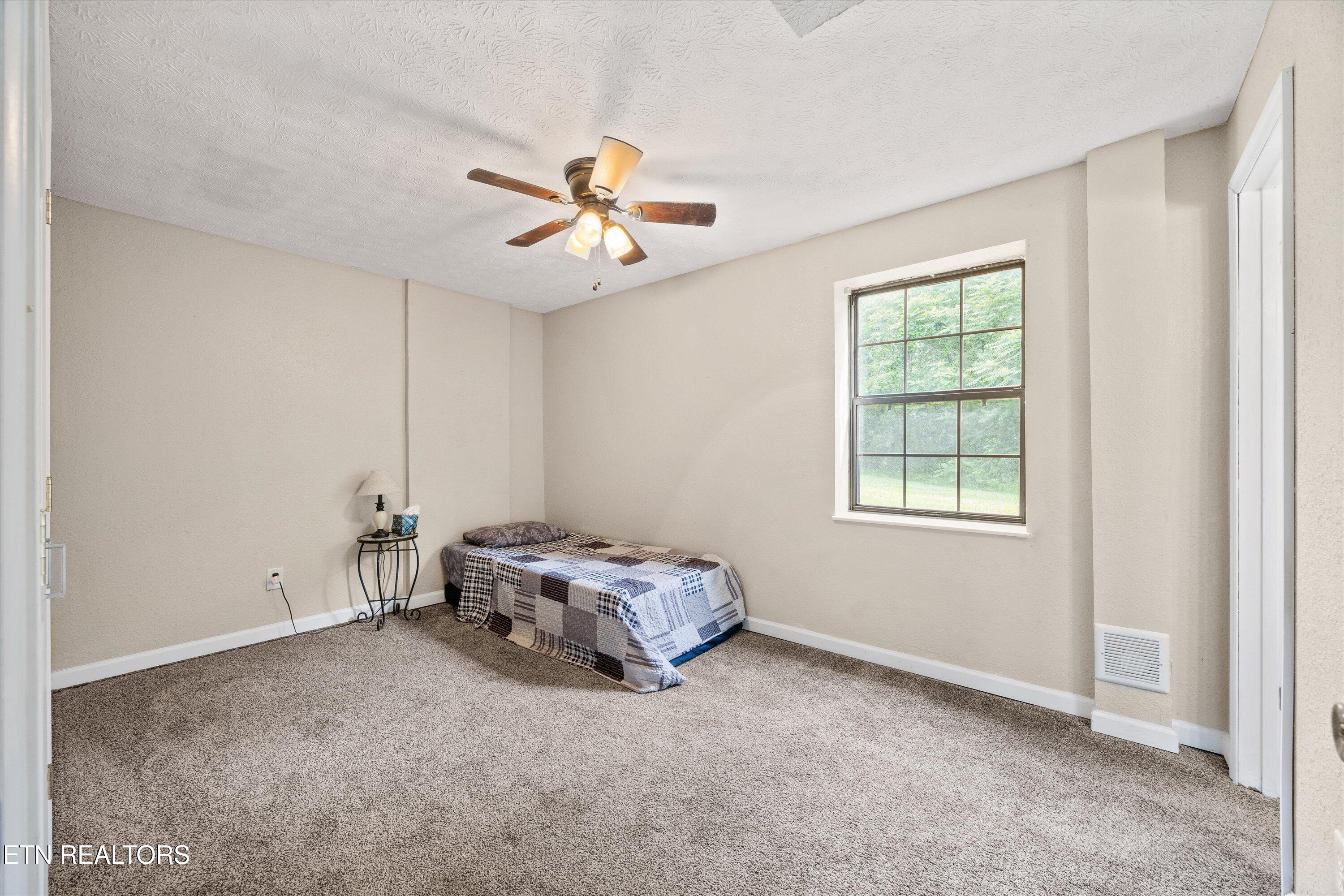 501 Big Sinks Road Sharps Chapel, TN 37866 - Photo 15 of 29 bedroom 3 with en suite bathroom