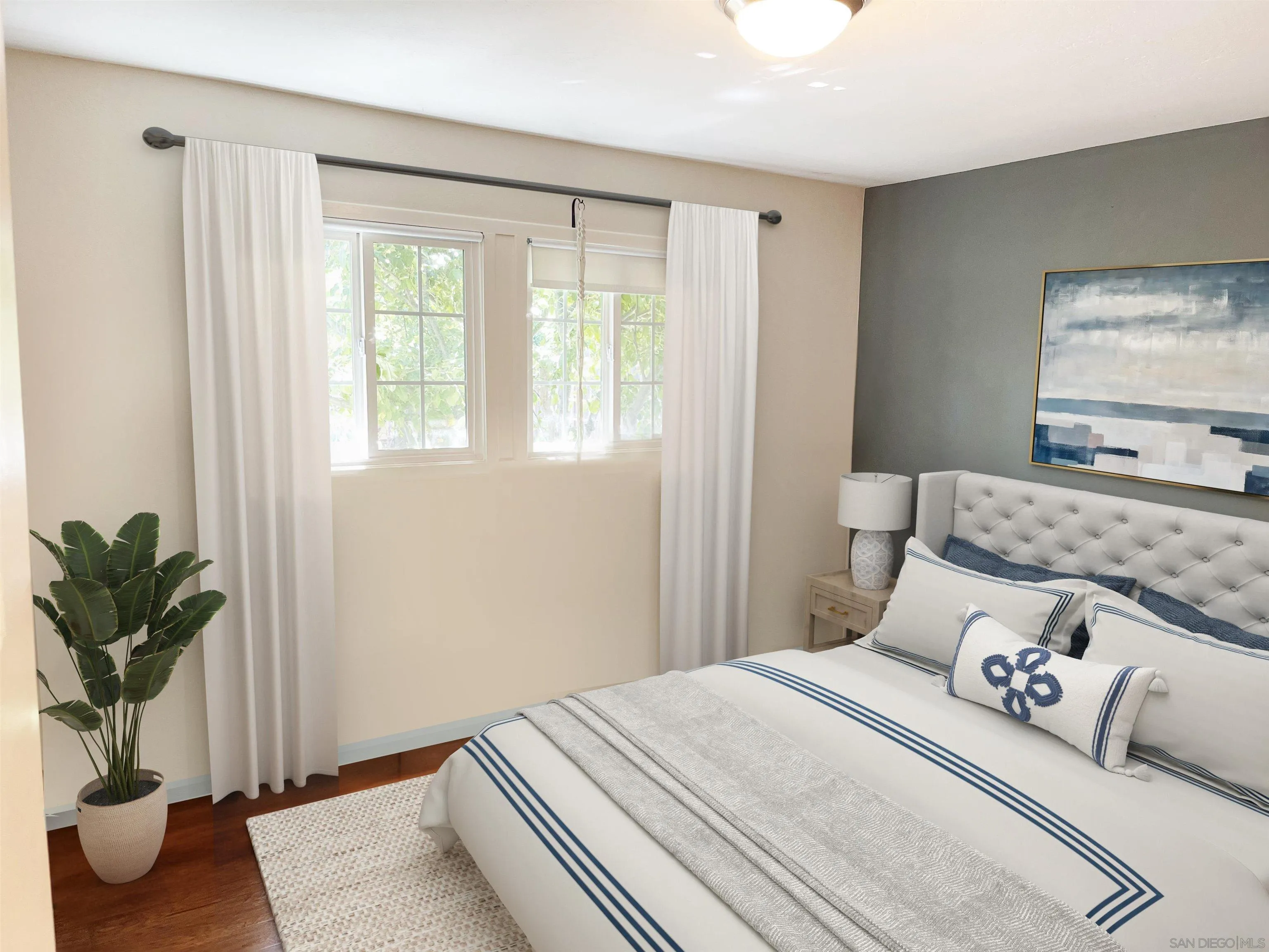 14150 Tobiasson Road Poway, CA 92064 - Photo 5 of 12 a bedroom with a large bed and a potted plant