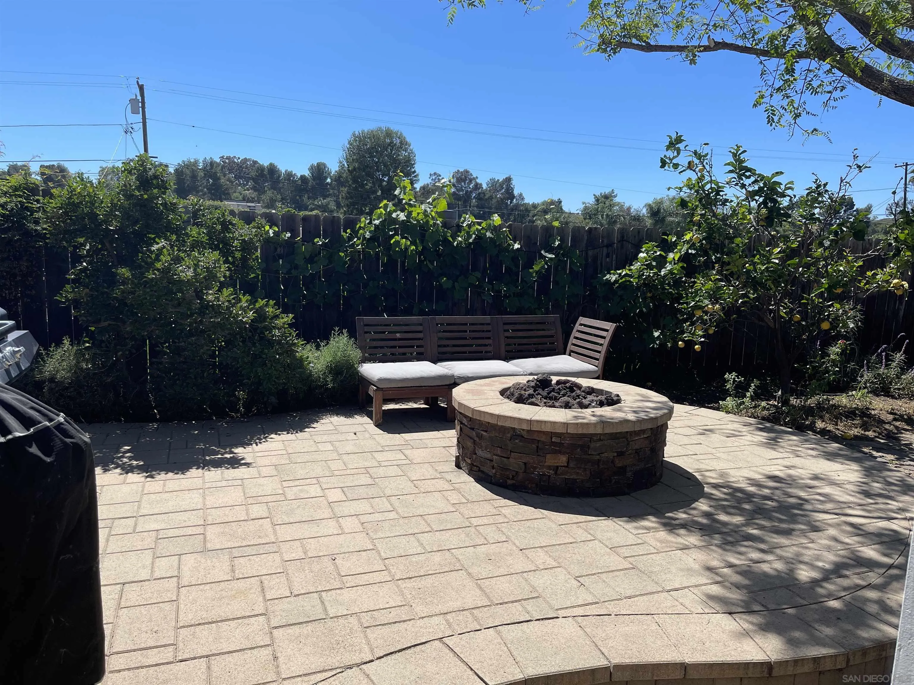 14150 Tobiasson Road Poway, CA 92064 - Photo 9 of 12 a view of back yard of the house