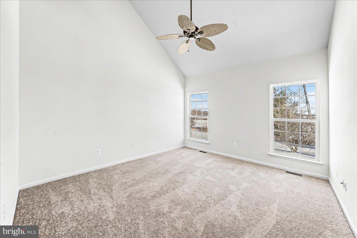 339 Pierce Run Newark, DE 19702 - Photo 20 of 37 an empty room with windows and fan