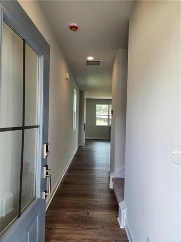 a kitchen with sink and window