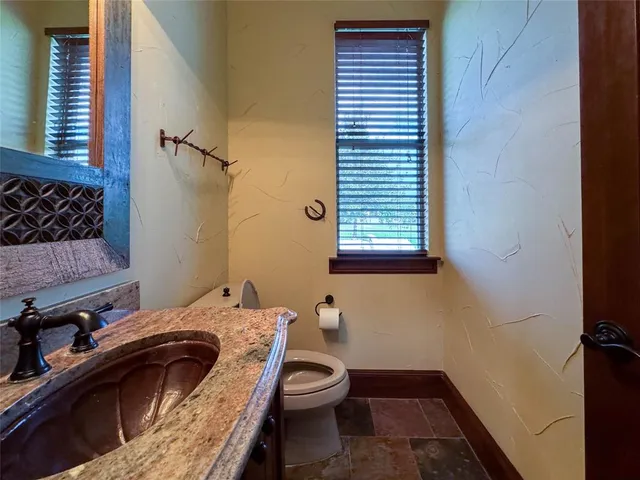 a view of a bathroom and a sink