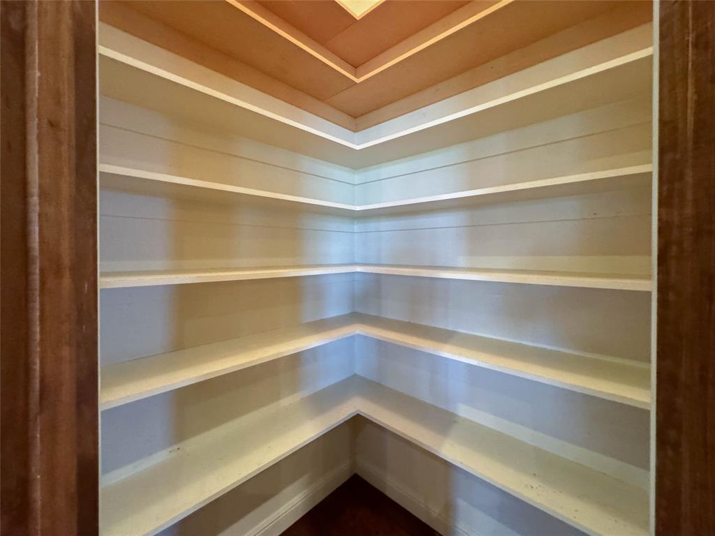 1559 East Blackjack Road East Pilot Point, TX 76258 - Photo 27 of 40 a storage room with wooden floor