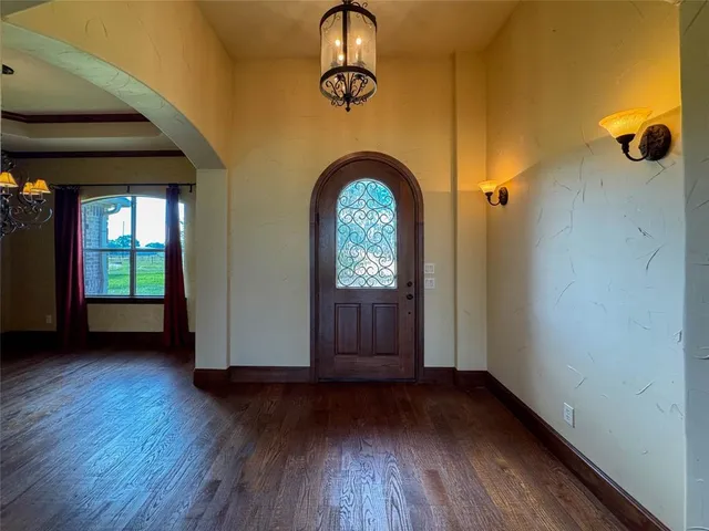 a view of entryway with wooden floor