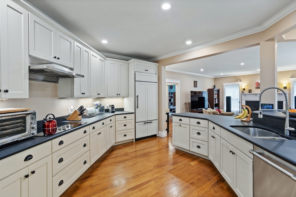 5 Walnut Street Lexington, MA 02421 - Photo 6 of 34 a large kitchen with cabinets