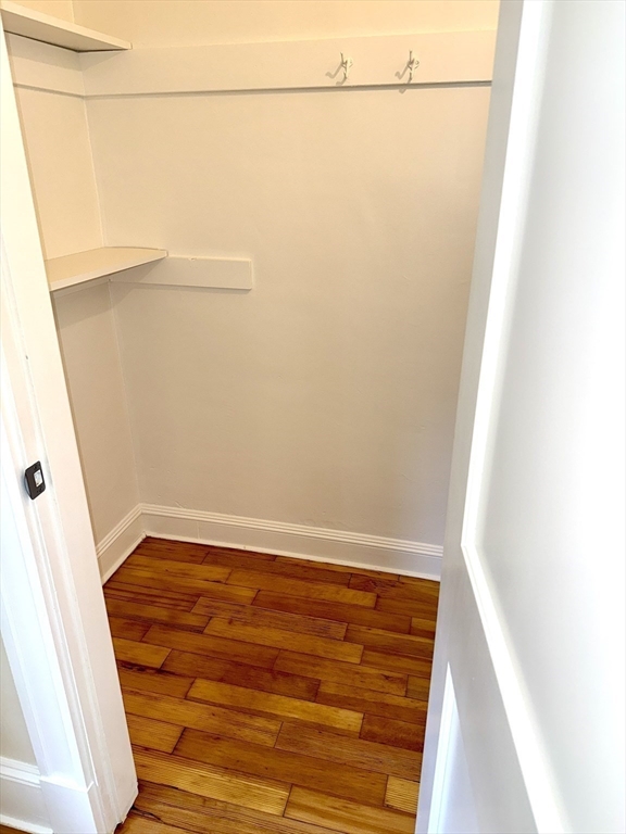 39 Newman Road Malden, MA 02148 - Photo 17 of 27 a view of a closet with wooden floor