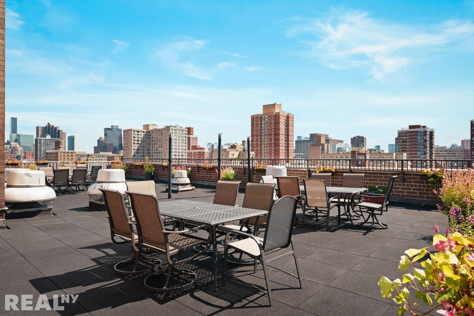 200 East 24th Street, Unit 706 Manhattan, NY 10010 - Photo 13 of 17 a view of a terrace with furniture