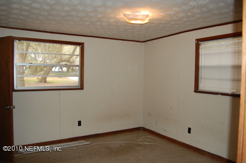 6974 Gatorbone Road Keystone Heights, FL 32656 - Photo 9 of 19 Master bedroom