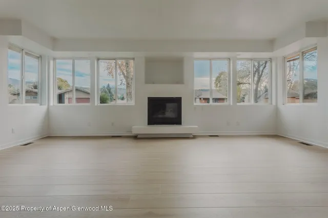 an empty room with windows