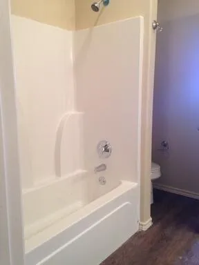 a bathroom with a sink double vanity and a mirror