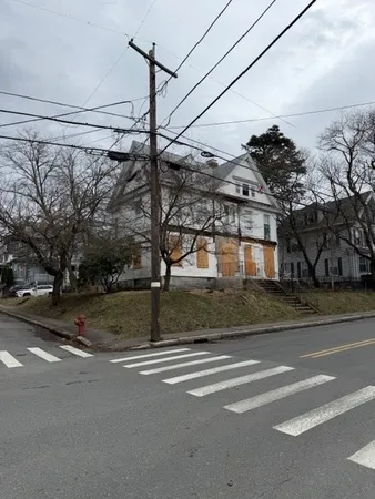 a view of a building with a street
