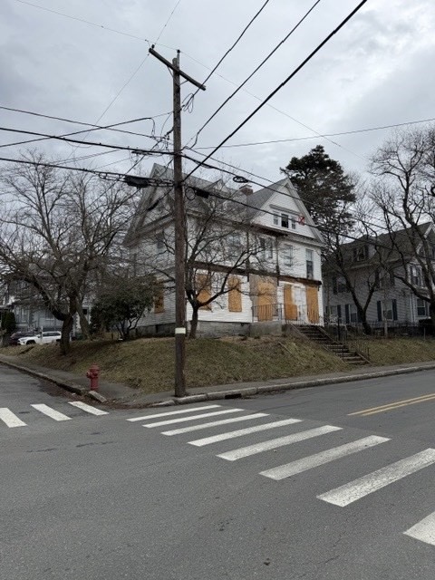 337 Beacon Street Lowell, MA 01850 - Photo 3 of 3 a view of a building with a street