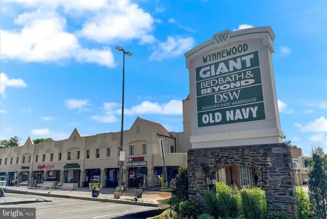a view of a building with a street