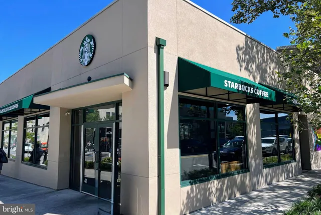 a front view of a building with street view