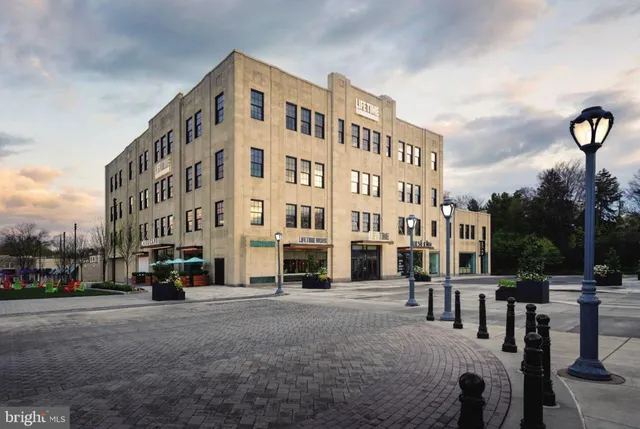 a view of a building with a street