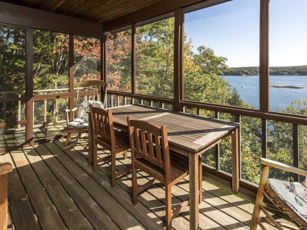 127 Appalachee Road Boothbay Harbor, ME 04538 - Photo 12 of 35 The water view screened porch.