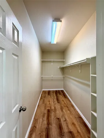 a view of a room with rack on the wall