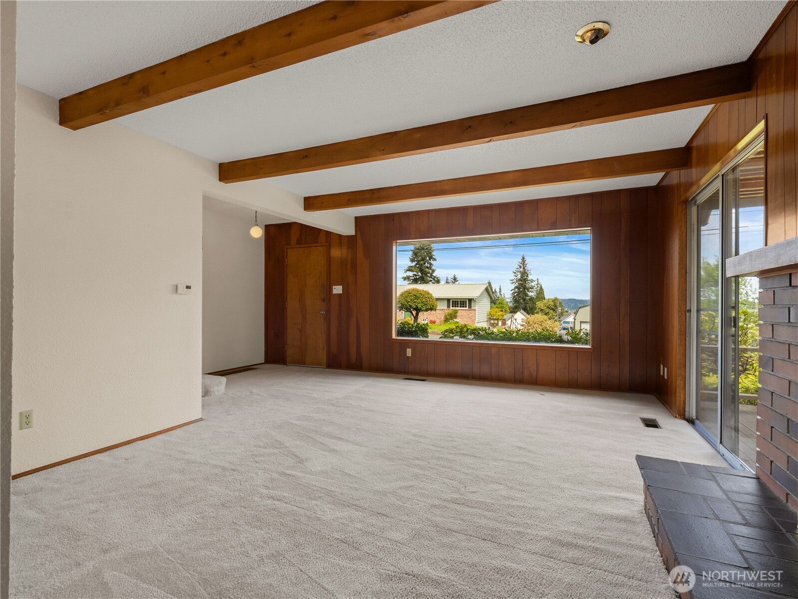 5704 North Ruby Street Tacoma, WA 98407 - Photo 9 of 38 a view of interior area with furniture and a window