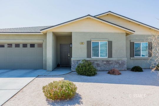 411 Abigail Street Ridgecrest, CA 93555 - Photo 2 of 39 a front view of a house