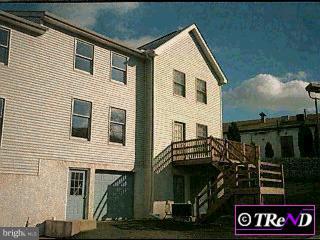 49 Grant Road Folcroft, PA 19032 - Photo 1 of 1 a view of a house with a balcony