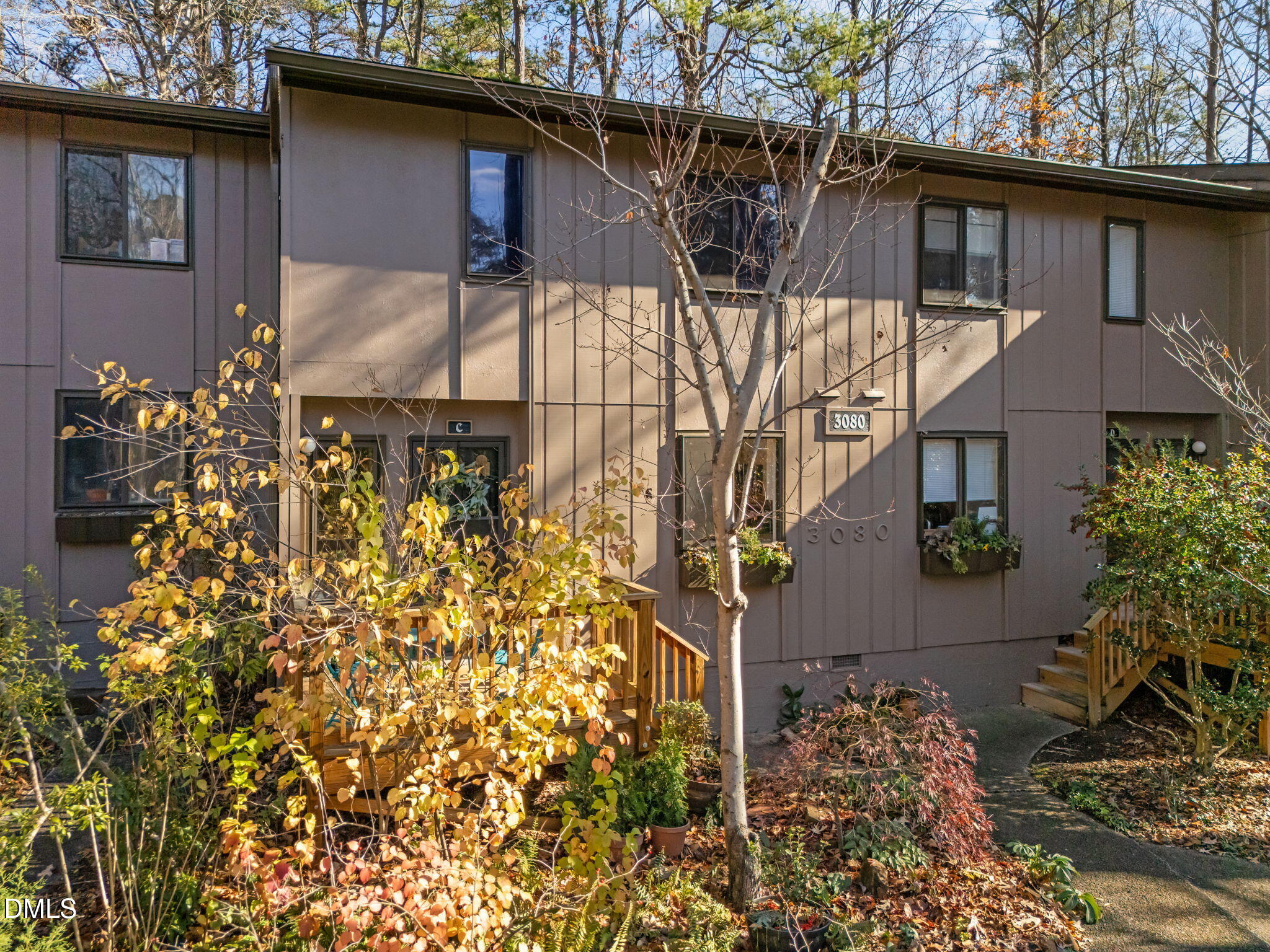 3080 Colony Road, Unit 3080C Durham, NC 27705 - Photo 43 of 57 a house with trees in front of it