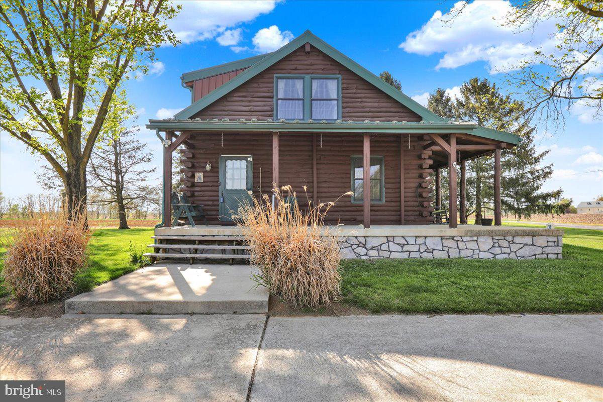 274 South Erisman Road Manheim, PA 17545 - Photo 5 of 43 a front view of a house with garden
