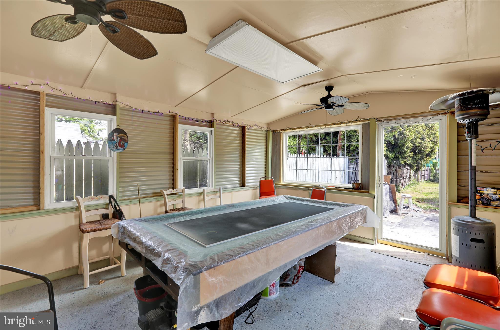 407 South 7th Street Reading, PA 19602 - Photo 21 of 36 a room with pool table and windows