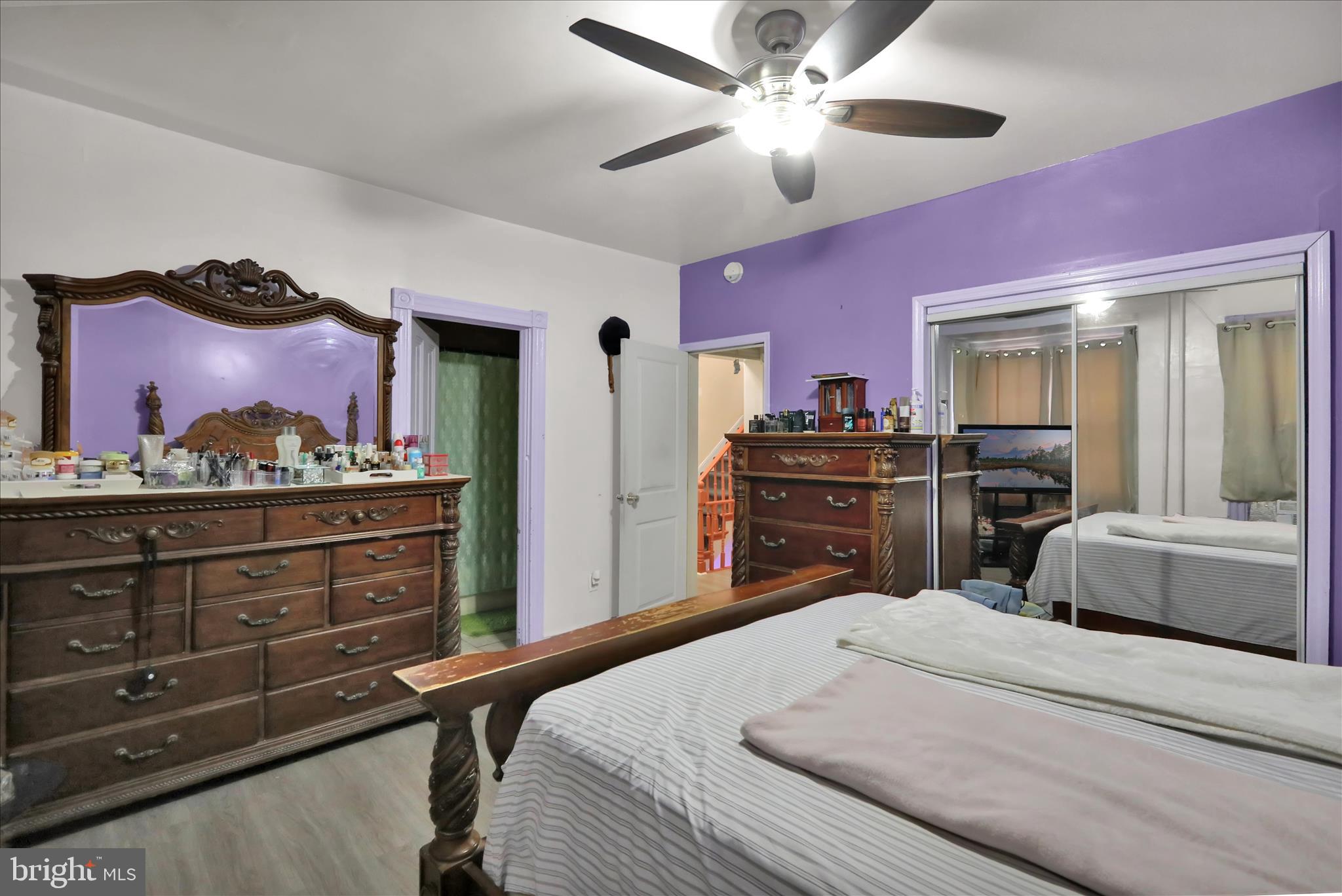 407 South 7th Street Reading, PA 19602 - Photo 35 of 36 a bedroom with a bed and a dresser