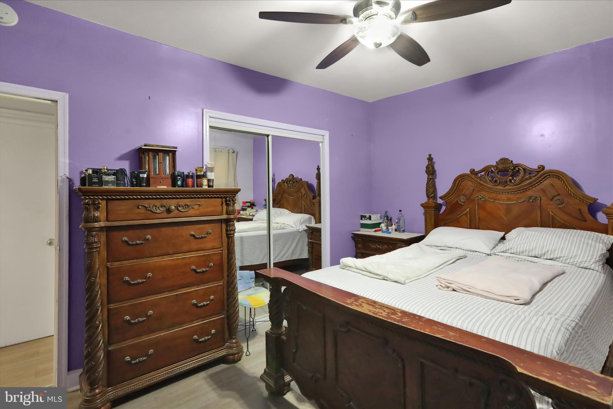 407 South 7th Street Reading, PA 19602 - Photo 36 of 36 a bedroom with a bed and a chandelier