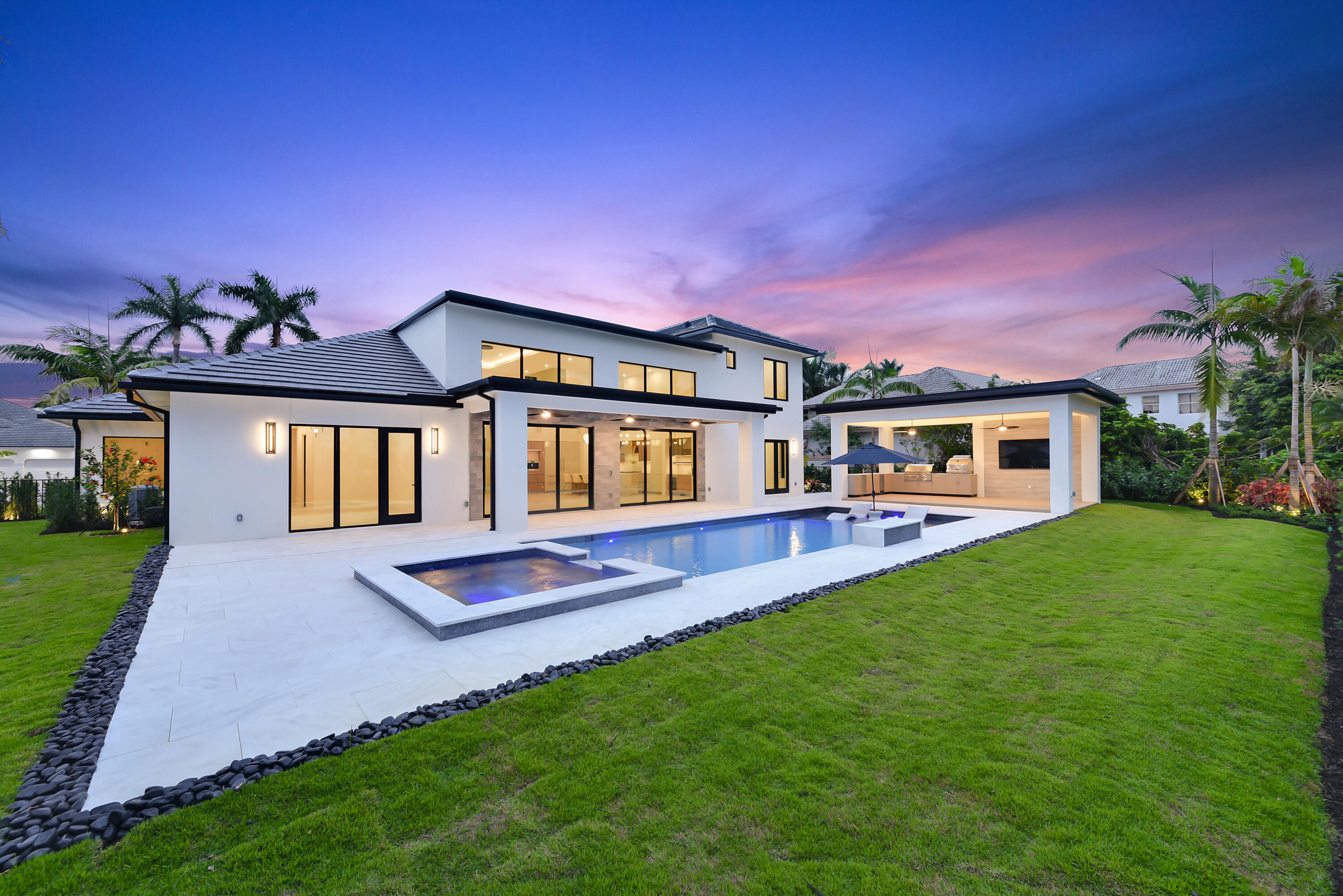 17577 Scarsdale Way Boca Raton, FL 33496 - Photo 18 of 145 a front view of a house with a yard
