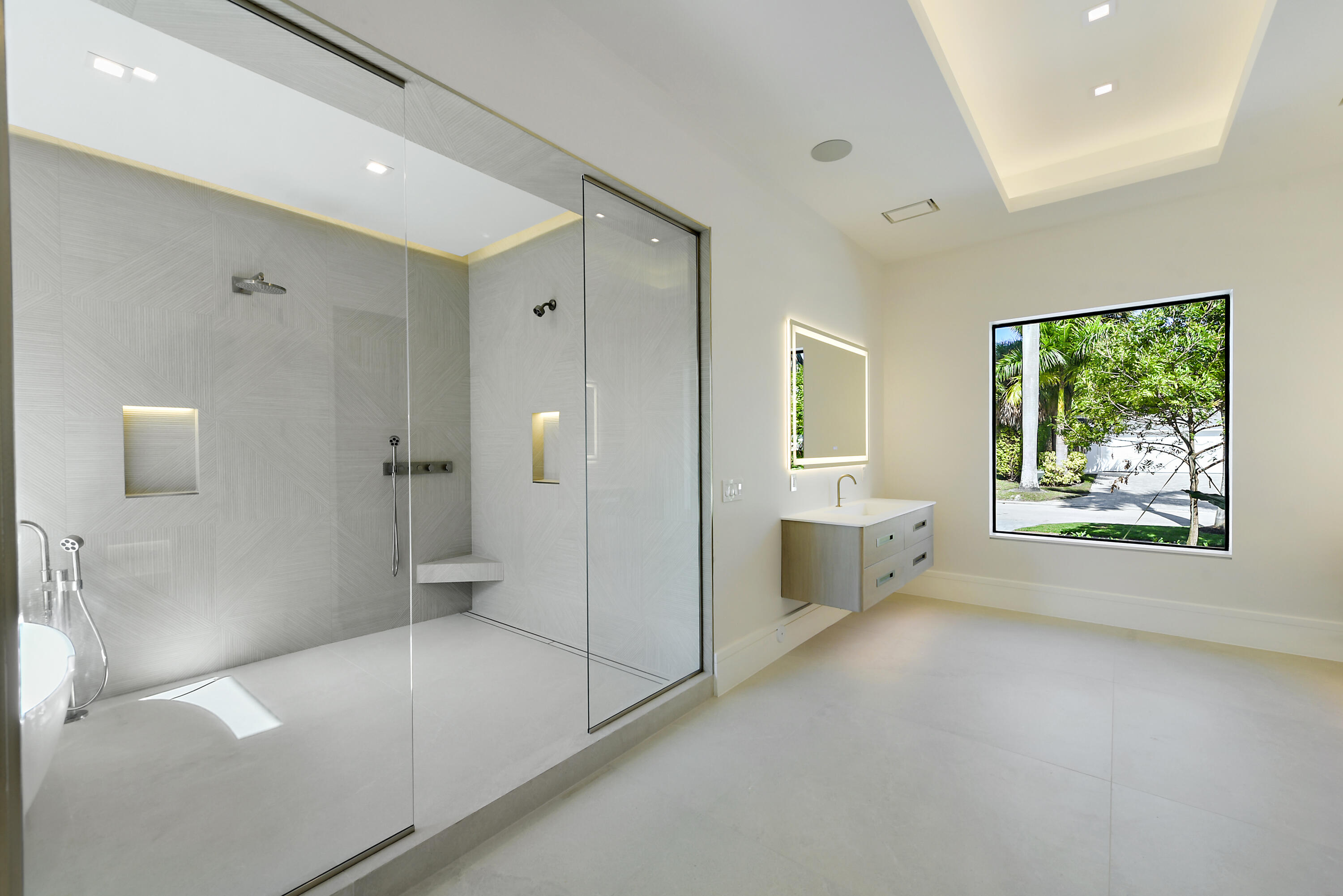 17577 Scarsdale Way Boca Raton, FL 33496 - Photo 36 of 145 a bathroom with a bathtub and a shower