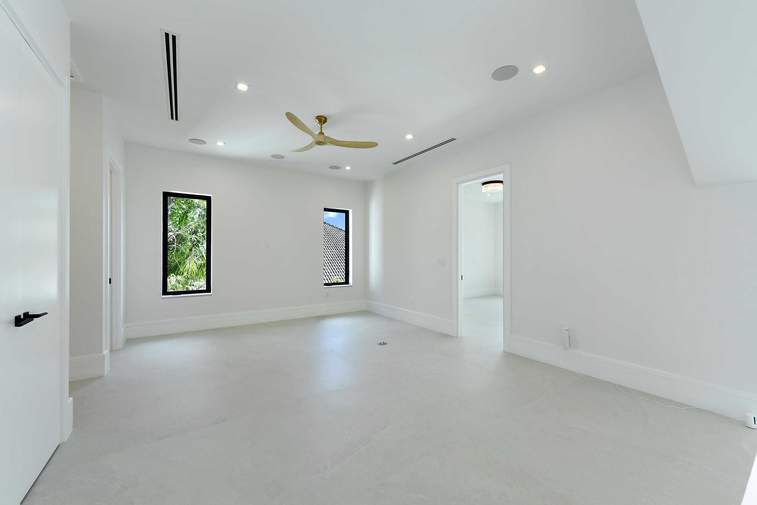 17577 Scarsdale Way Boca Raton, FL 33496 - Photo 55 of 145 an empty room with windows and closet