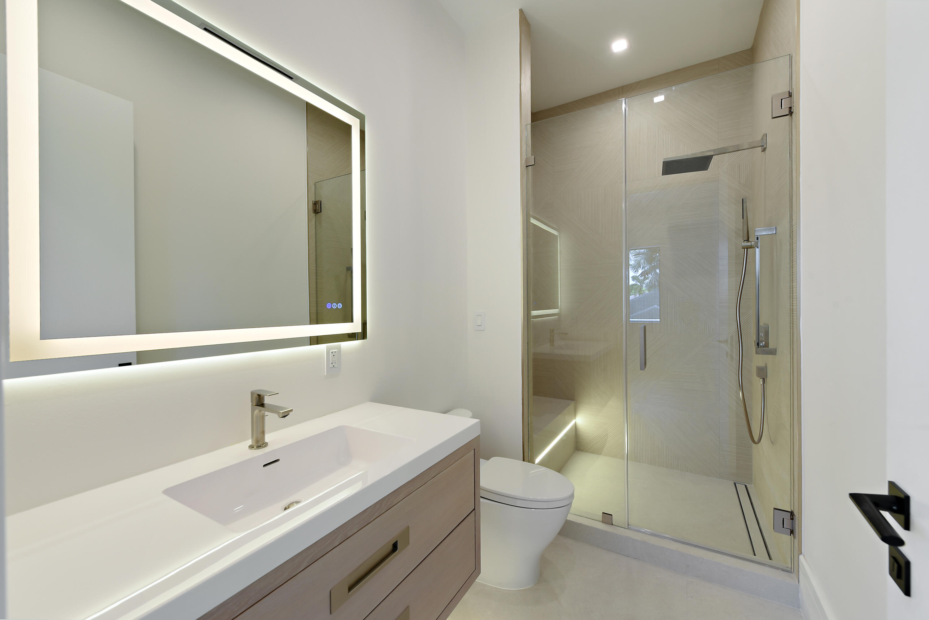 17577 Scarsdale Way Boca Raton, FL 33496 - Photo 64 of 145 a bathroom with a sink mirror toilet and shower