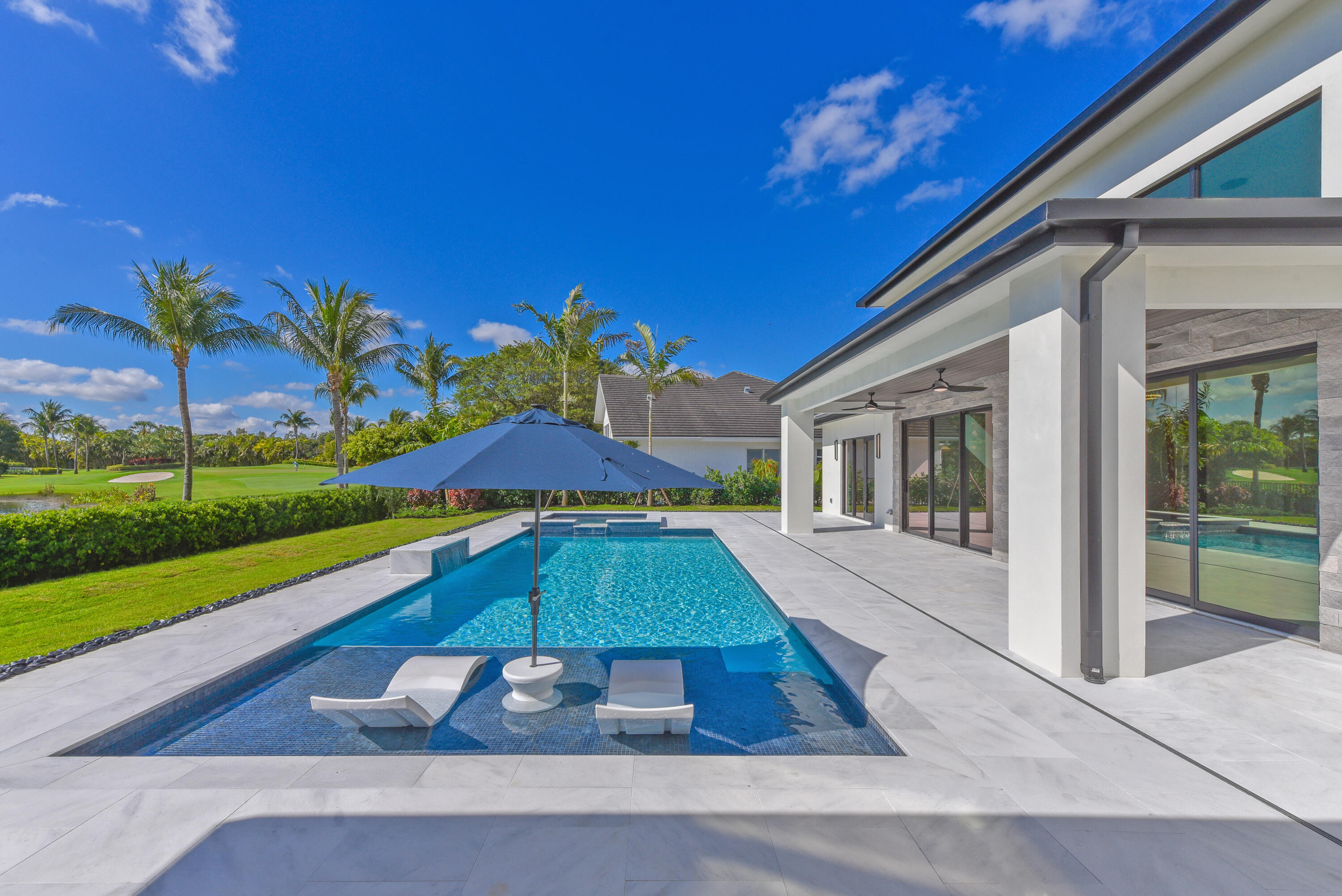 17577 Scarsdale Way Boca Raton, FL 33496 - Photo 68 of 145 a view of a house with a yard and potted plants