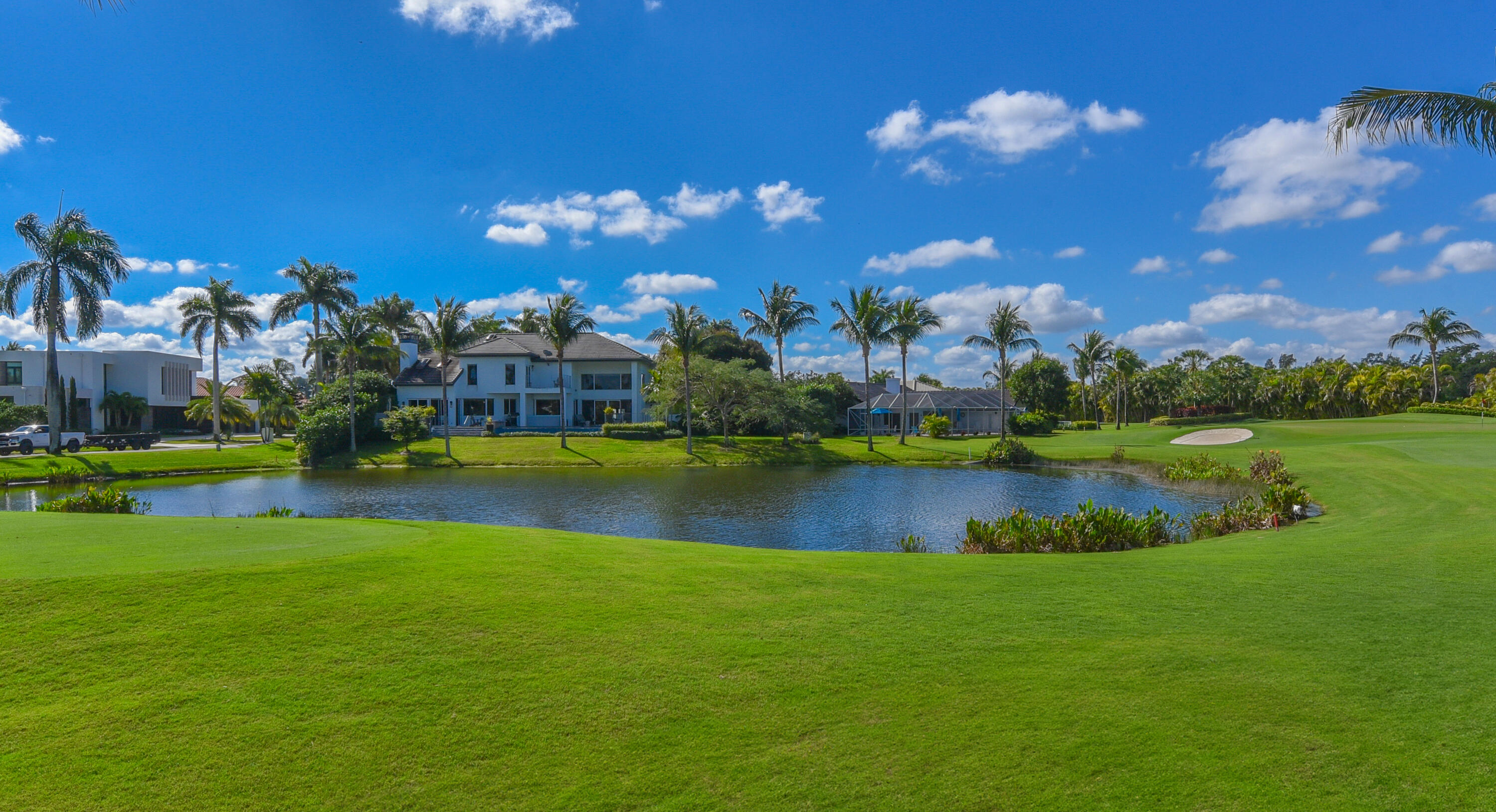 17577 Scarsdale Way Boca Raton, FL 33496 - Photo 83 of 145 a view of a house with a swimming pool and a yard