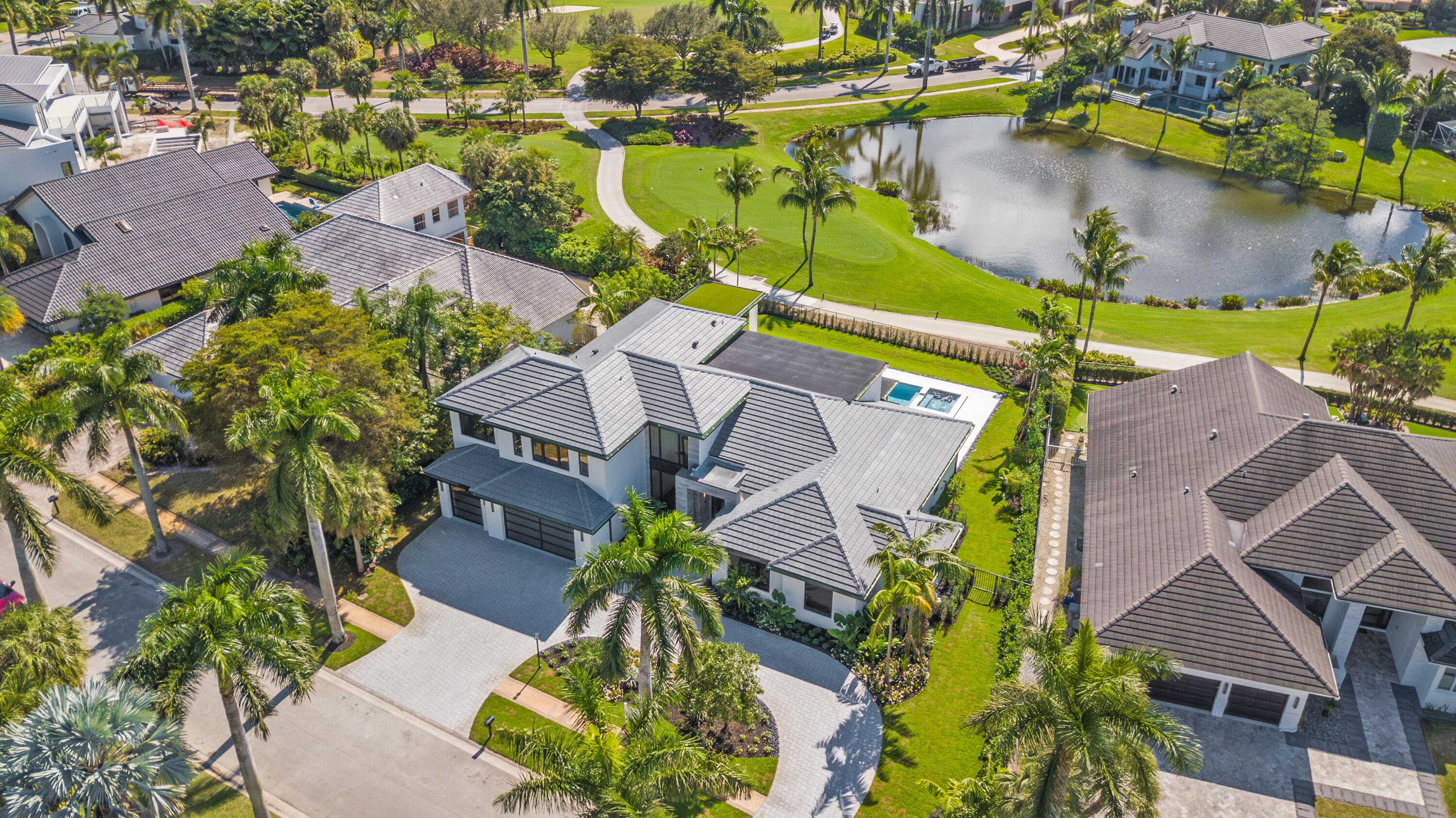 17577 Scarsdale Way Boca Raton, FL 33496 - Photo 85 of 145 an aerial view of a house with a lake view