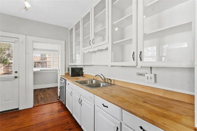 a view of storage and utility room with washer and dryer