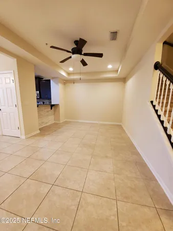 a view of a livingroom with a staircase