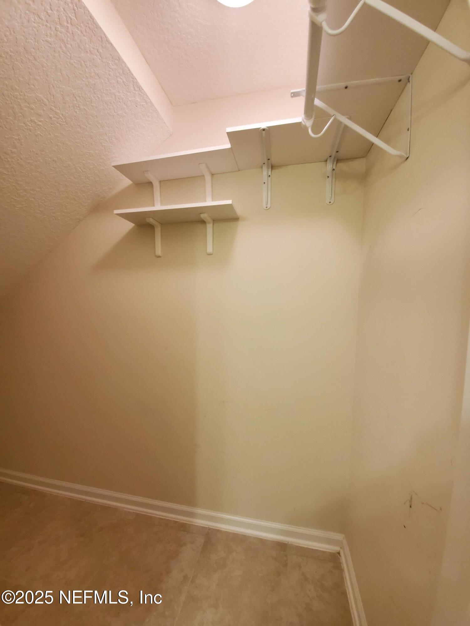 13 La Paz Way St. Augustine, FL 32092 - Photo 23 of 24 a view of small space with racks on the wall